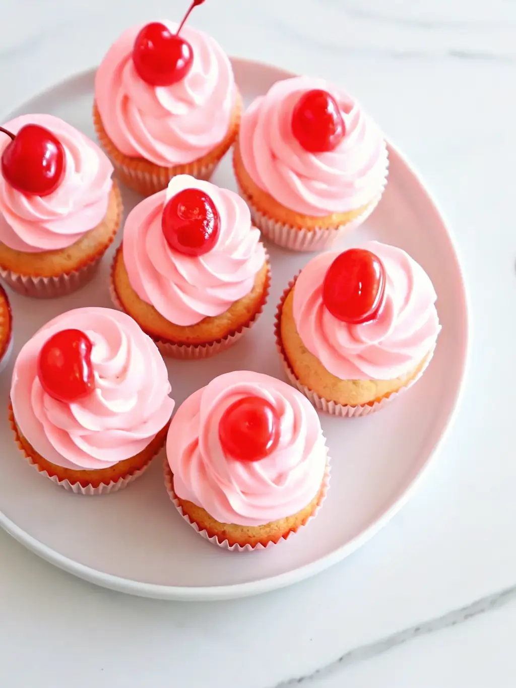 A bowl of chopped, floured maraschino cherries next to a bowl of dry ingredients and a glass of buttermilk, all arranged on a light wooden cutting board on a bright marble countertop. Natural morning light illuminates the scene, creating warm tones and soft shadows. NO HANDS OR PEOPLE. (3:4 ratio)