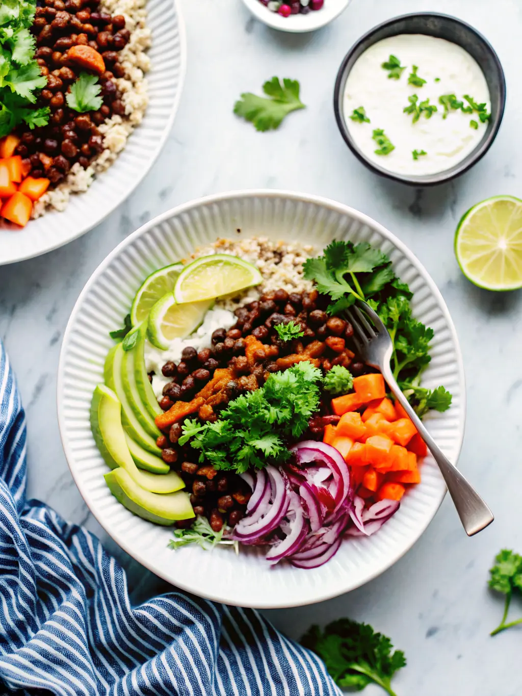 Serving focus shot (3:4) of a single Beef Burrito Bowl, slightly angled, showcasing the textures: the fluffy white rice, the rich brown beef, the vivid orange sweet potatoes, the creamy green avocado, and the purple pickled onions. A fork is casually placed in the bowl, hinting at enjoyment. A small bowl of the creamy green sauce is slightly blurred in the background. Natural morning light, soft shadows, on a minimalist white ceramic plate on a marble countertop. No hands or people.